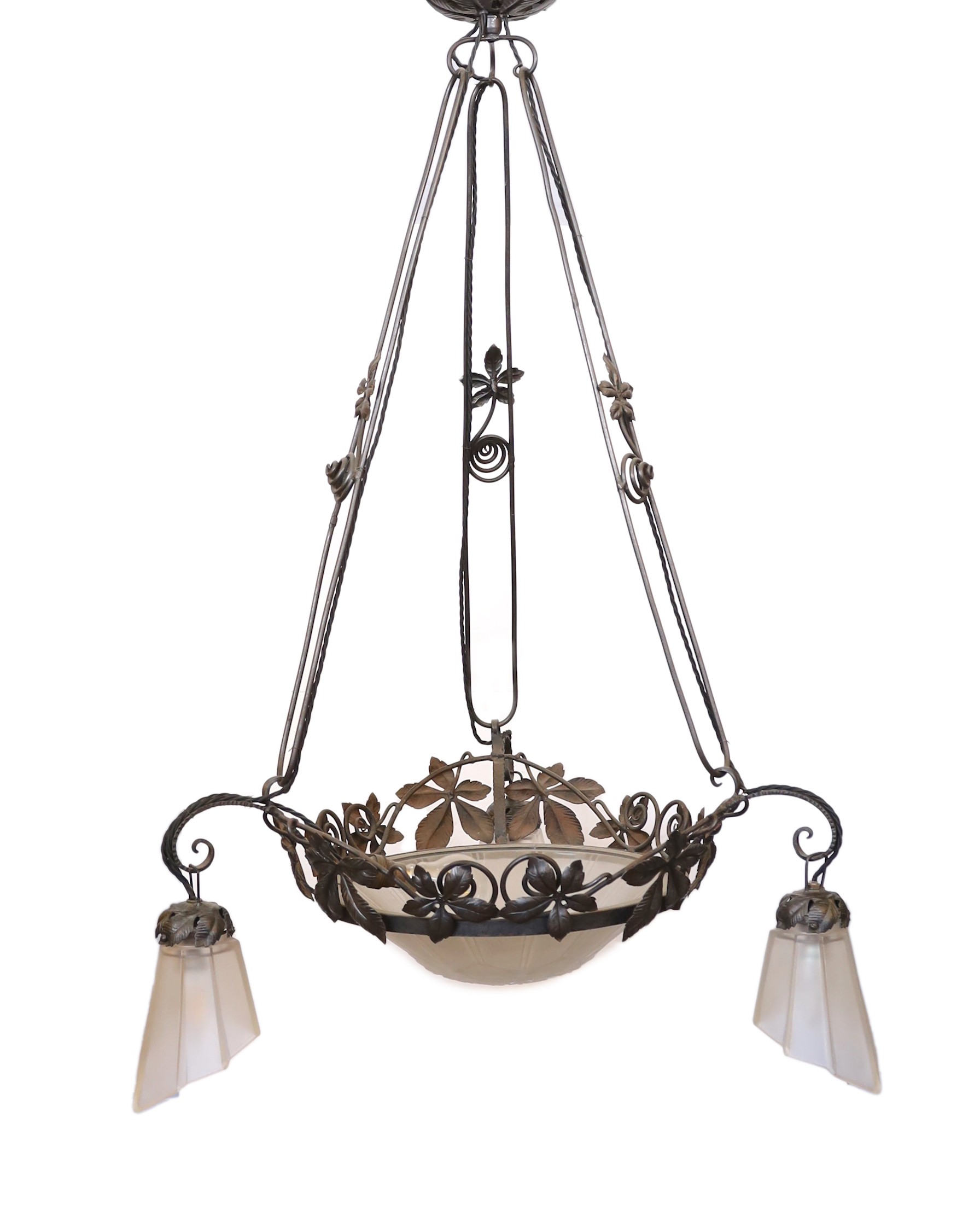A 1930s French wrought iron and frosted glass light fitting, signed Genet & Michon, height 105cm. width 62cm